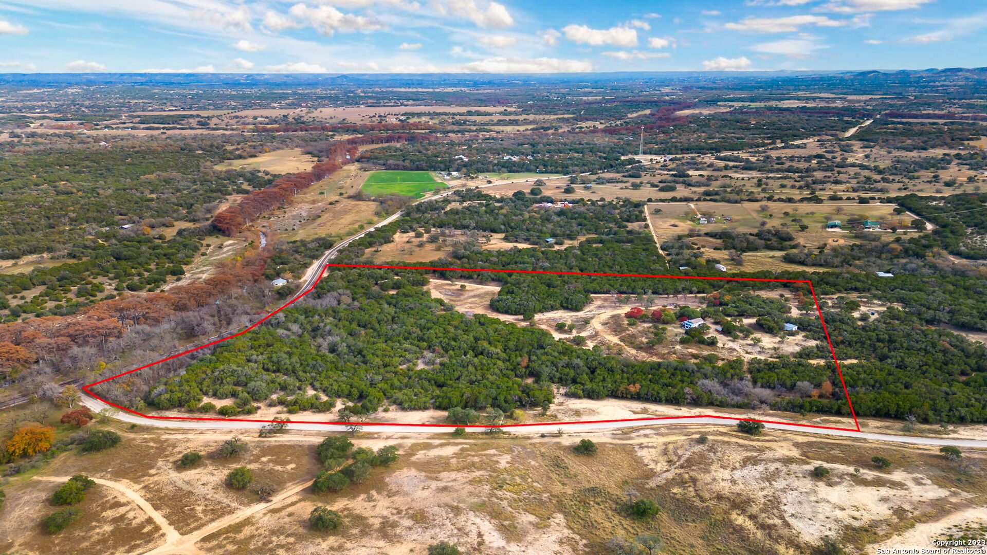 8417 Highway 16 Bandera, TX 78003 - Photo 4 of 28 an aerial view of residential houses with outdoor space