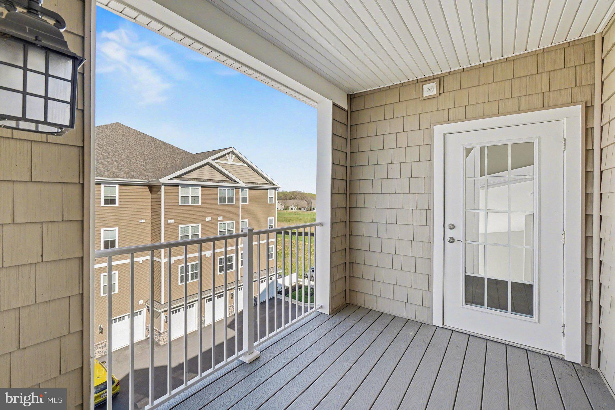 406 Bold Ruler Court, Unit 402 Havre de Grace, MD 21078 - Photo 15 of 59 a view of wooden balcony