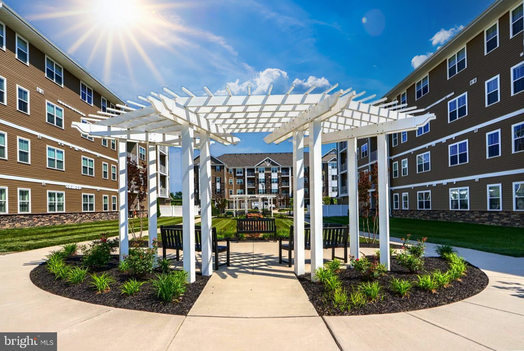 406 Bold Ruler Court, Unit 402 Havre de Grace, MD 21078 - Photo 31 of 59 a view of a building with a porch