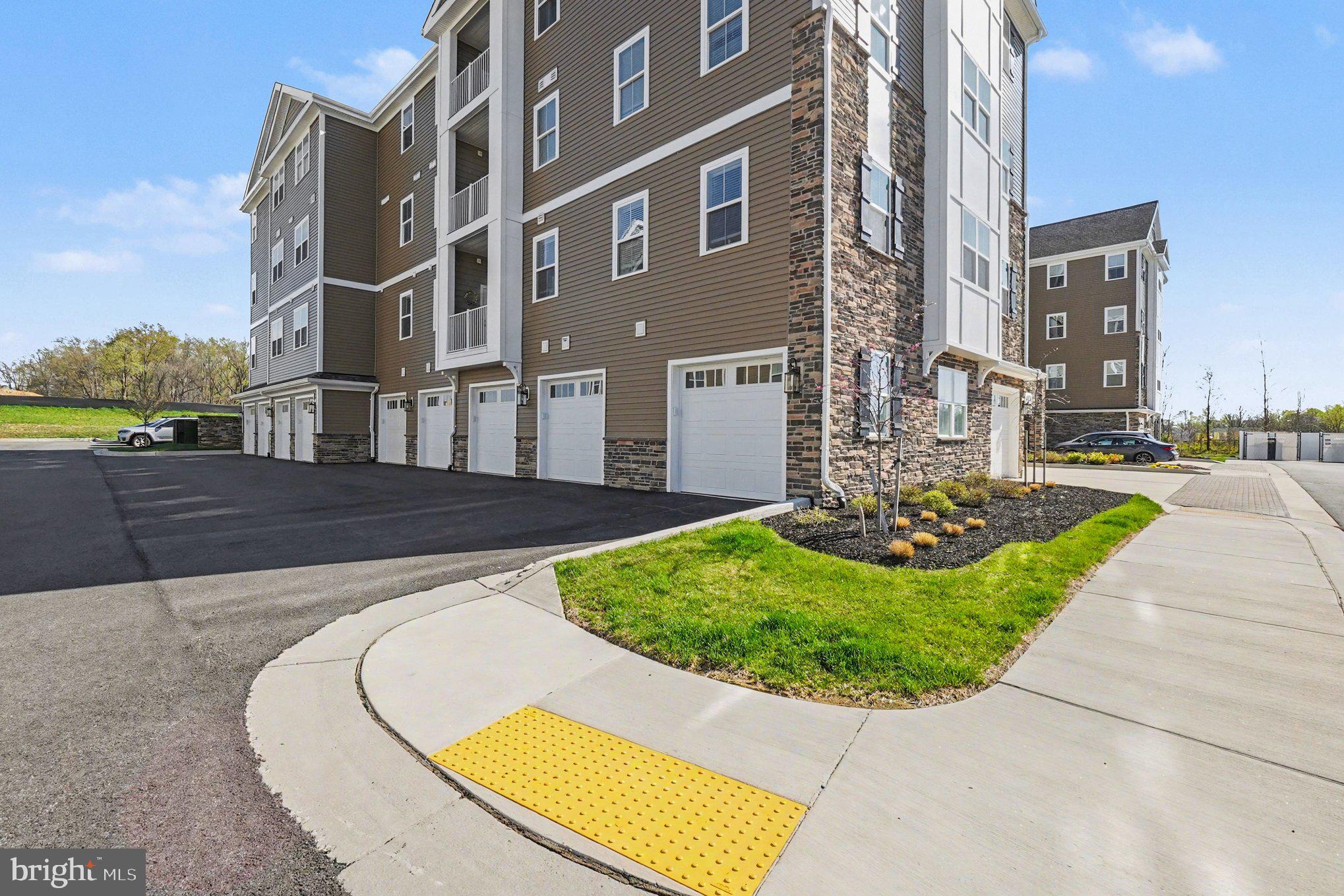 406 Bold Ruler Court, Unit 402 Havre de Grace, MD 21078 - Photo 4 of 59 a view of a swimming pool with a lounge chairs