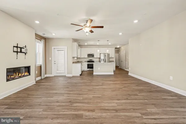 a view of livingroom with hardwood floor and window