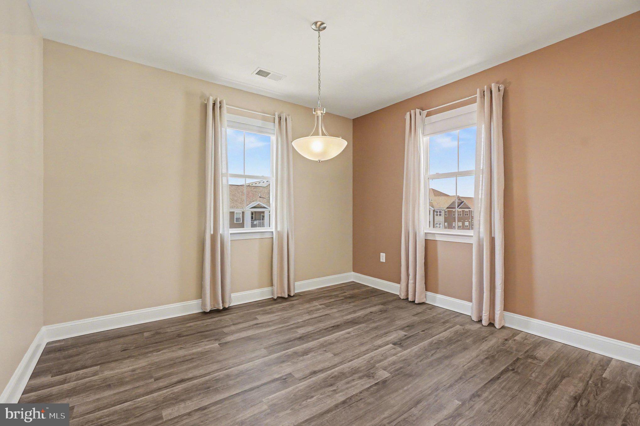406 Bold Ruler Court, Unit 402 Havre de Grace, MD 21078 - Photo 9 of 59 a view of livingroom with hardwood floor and window