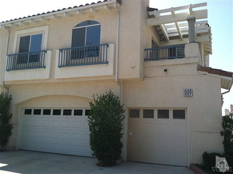 4249 Rusticview Court Moorpark, CA 93021 - Photo 1 of 7 a view of a house with a yard