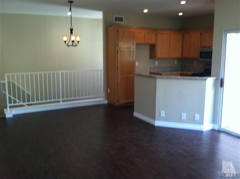 4249 Rusticview Court Moorpark, CA 93021 - Photo 3 of 7 a view of a kitchen with a sink and dishwasher