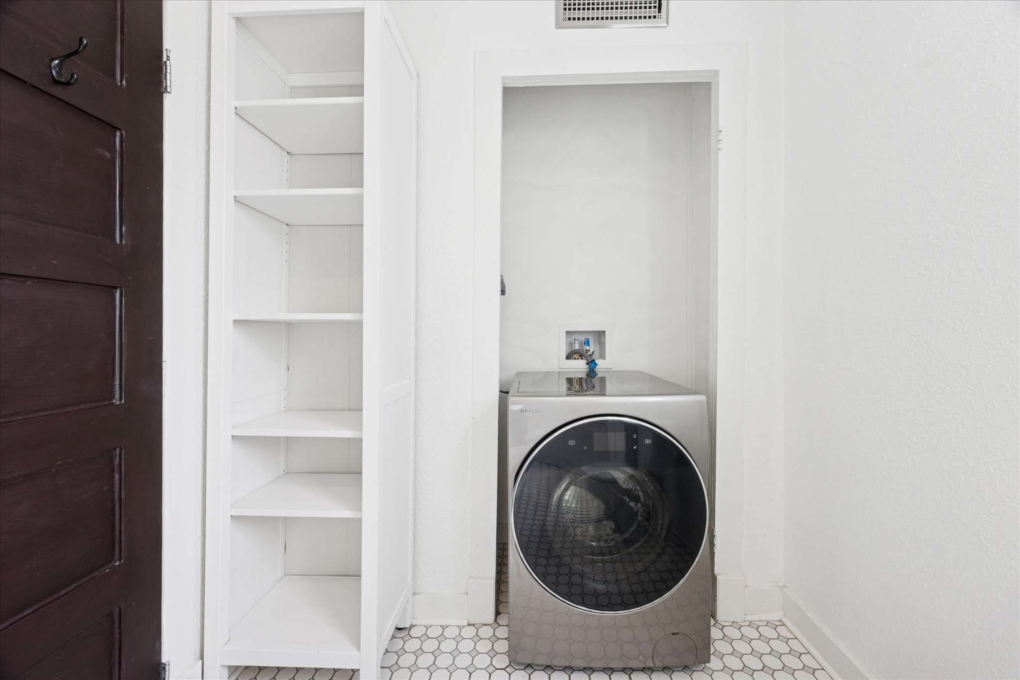 1210 Coleto Street Austin, TX 78702 - Photo 14 of 22 a utility room with washing machine