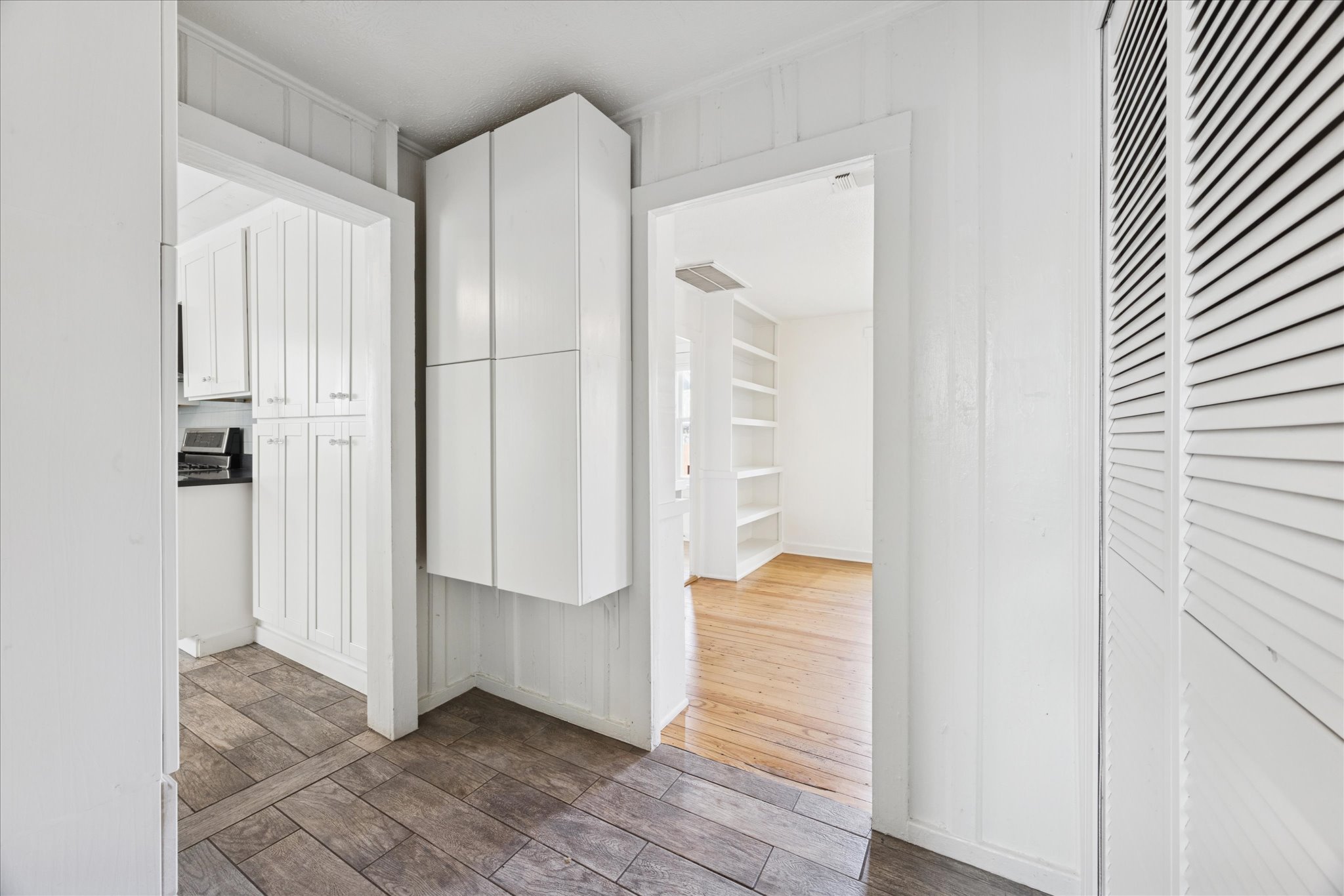 1210 Coleto Street Austin, TX 78702 - Photo 15 of 24 Hallway with plenty of storage space and laundry closet