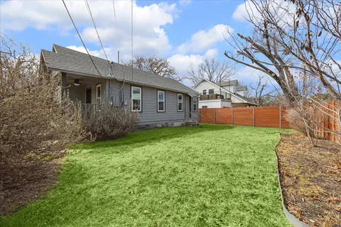 a view of a house with a street
