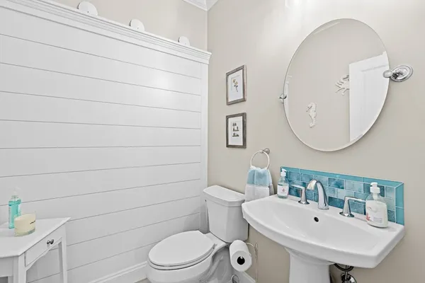 a view of a livingroom with furniture and a window