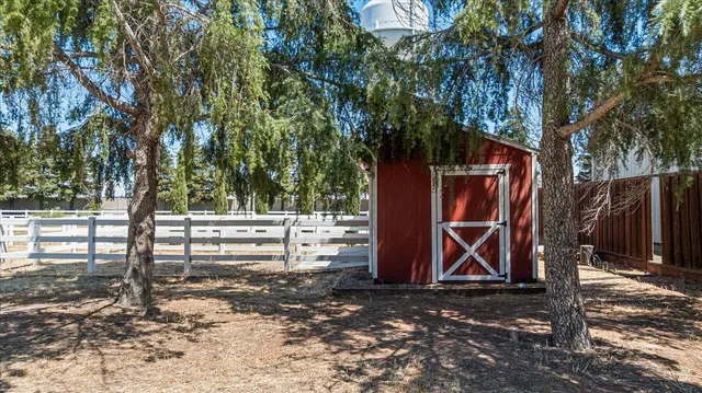 a front view of a building with street view