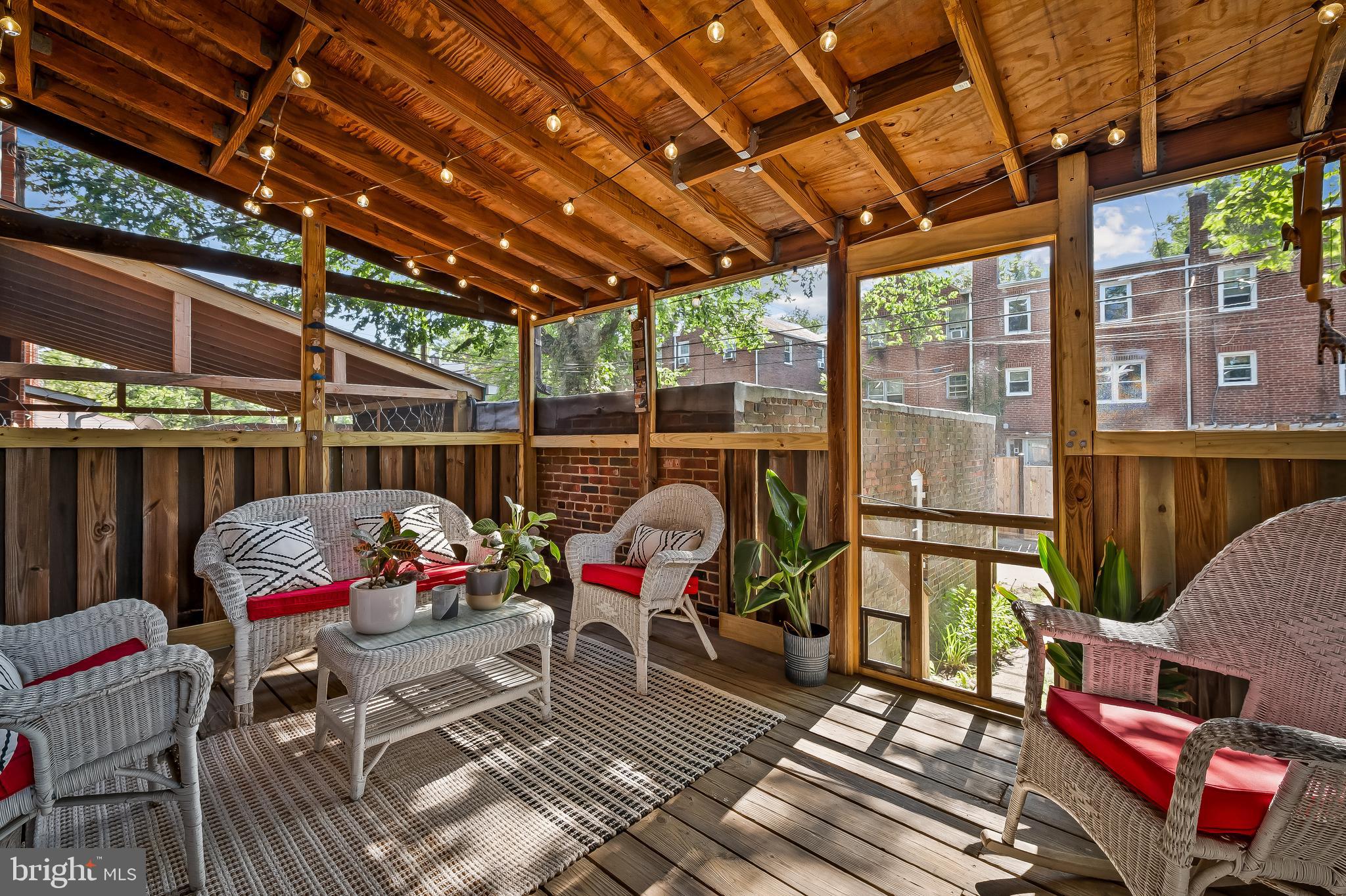 3718 Yolando Road Baltimore, MD 21218 - Photo 45 of 53 a view of a chairs in patio with a dining table and chairs