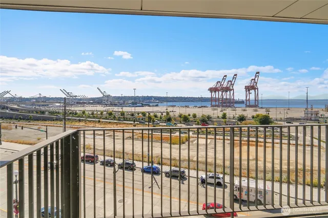 a view of a balcony with city view