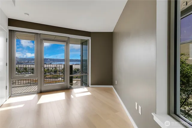 a view of an empty room with a window