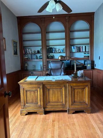 a bathroom with a double vanity sink a mirror and a shower