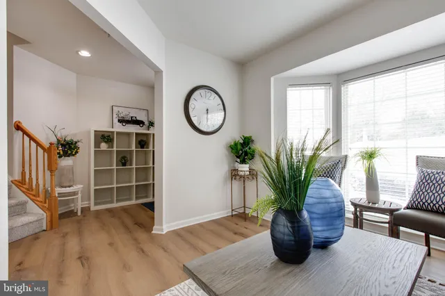 a view of a living room and wooden floor