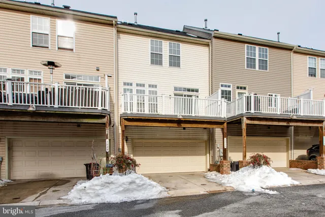 a front view of a house with a patio