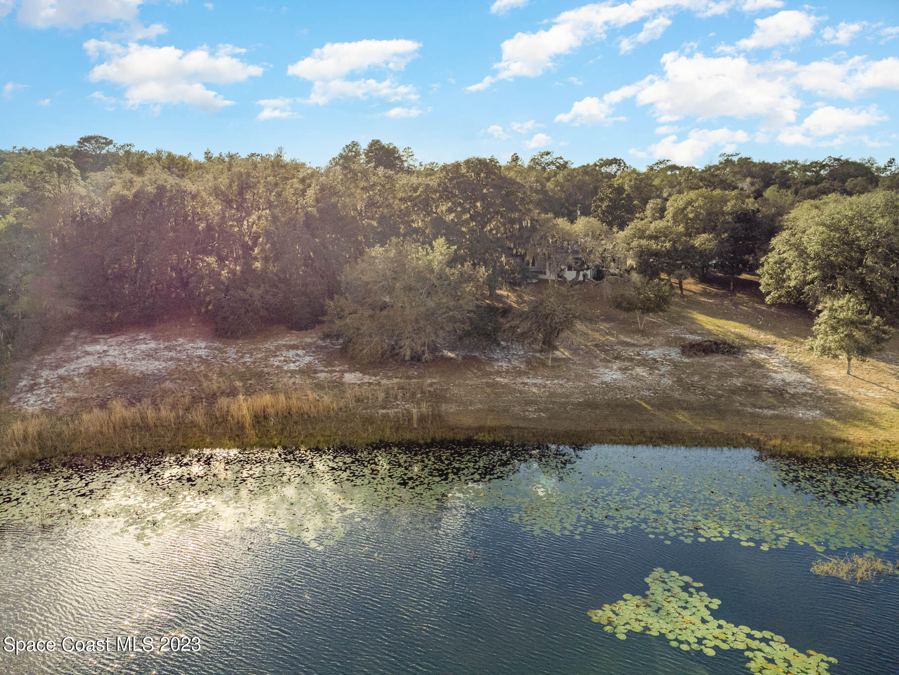 8203 Lake Echo Ridge Drive Melrose, FL 32666 - Photo 11 of 31 a view of a lake with a mountain