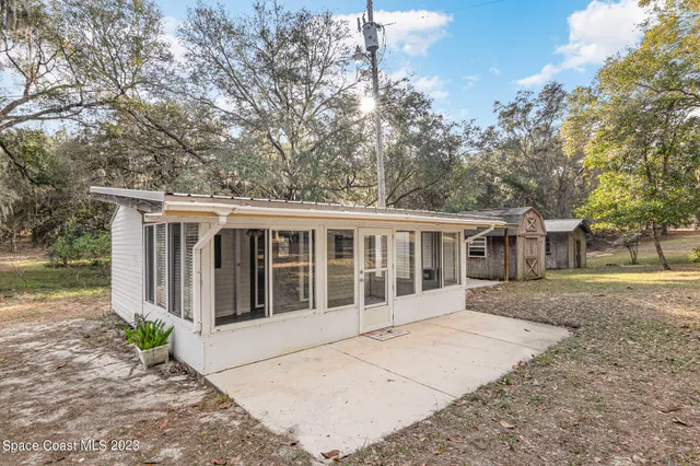 a view of a house with a garden