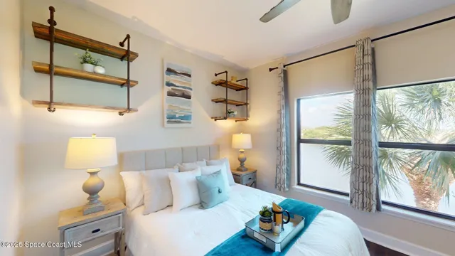 a bedroom with furniture and a window