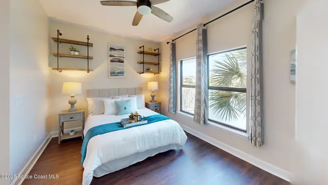 a bed room with a bed and a window