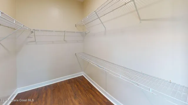 a view of small space with racks on the wall