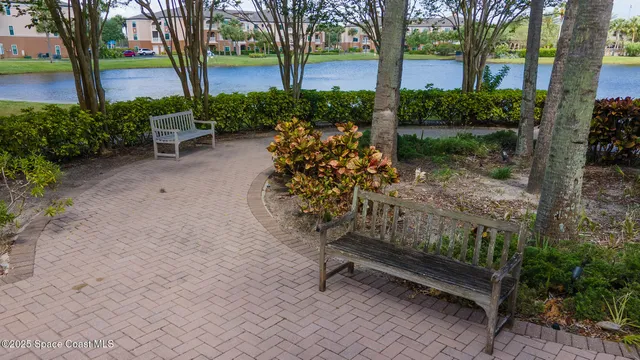 a view of a bench in a garden