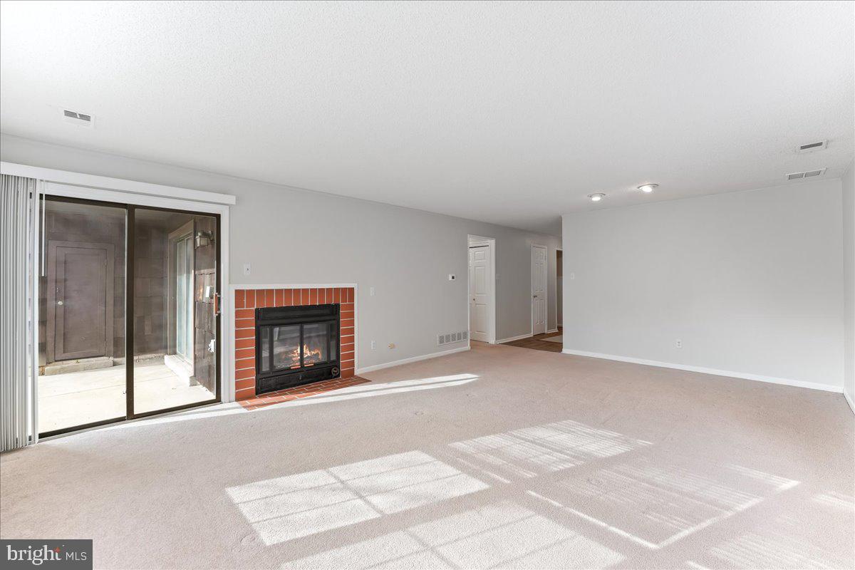 44 Witherspoon Court, Unit 137 Chesterbrook, PA 19087 - Photo 14 of 26 a view of a livingroom with a fireplace