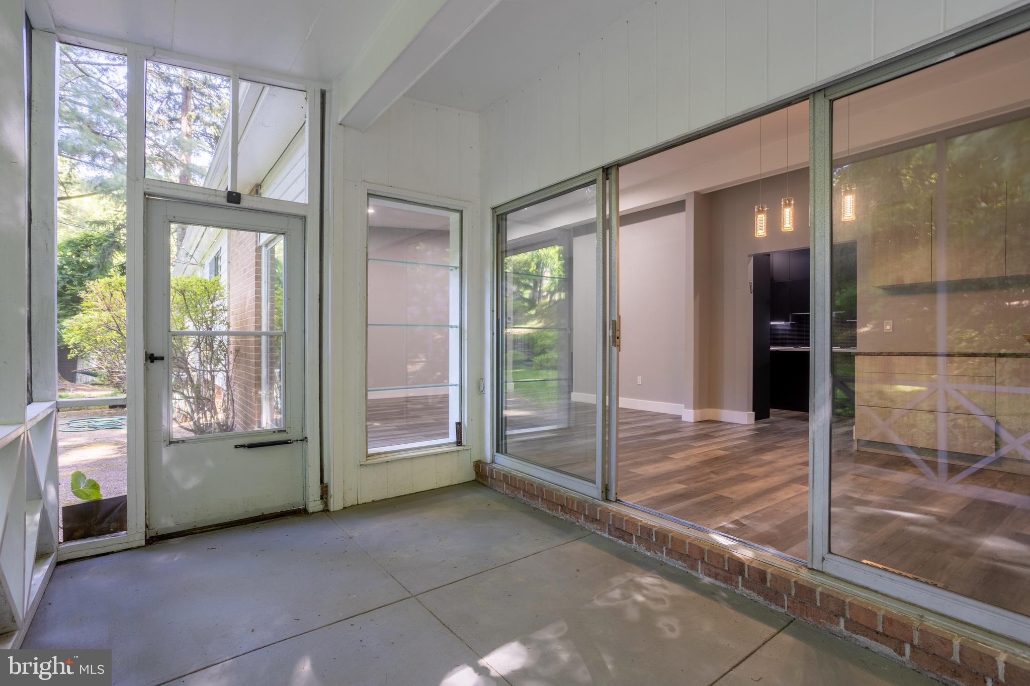3207 Midfield Road Pikesville, MD 21208 - Photo 41 of 45 a view of an entryway with a floor to ceiling window and an entryway