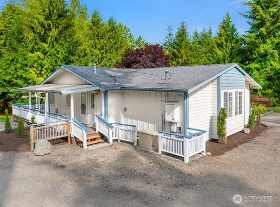 13315 Lost Lake Road Snohomish, WA 98296 - Photo 17 of 19 a patio with sofas table and chairs