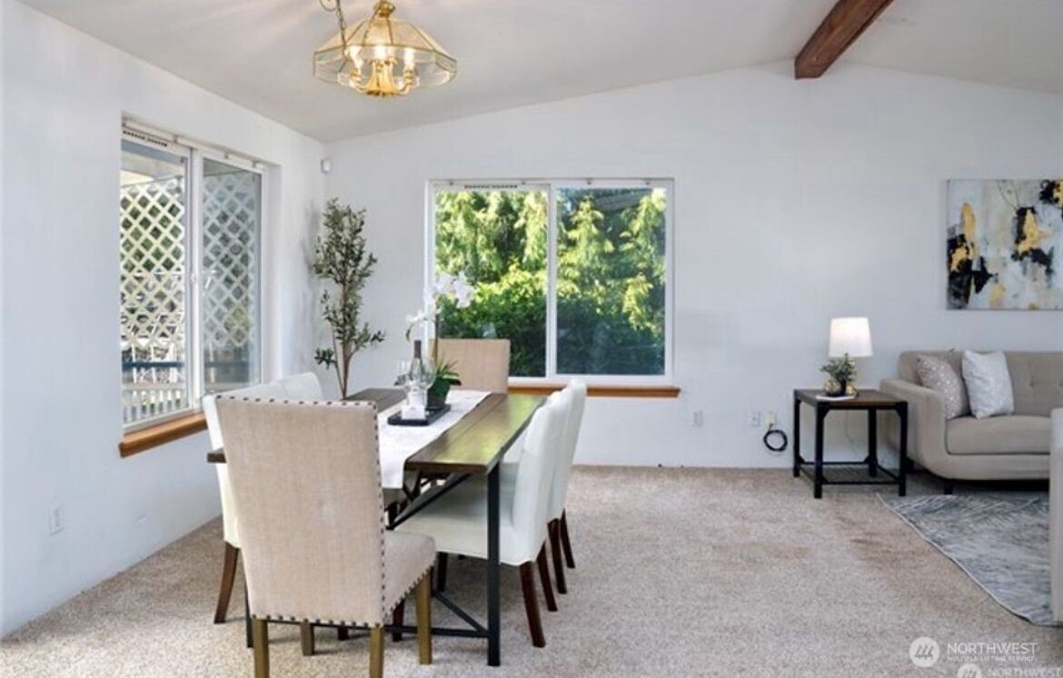 13315 Lost Lake Road Snohomish, WA 98296 - Photo 8 of 19 a dining room with furniture a rug and a window