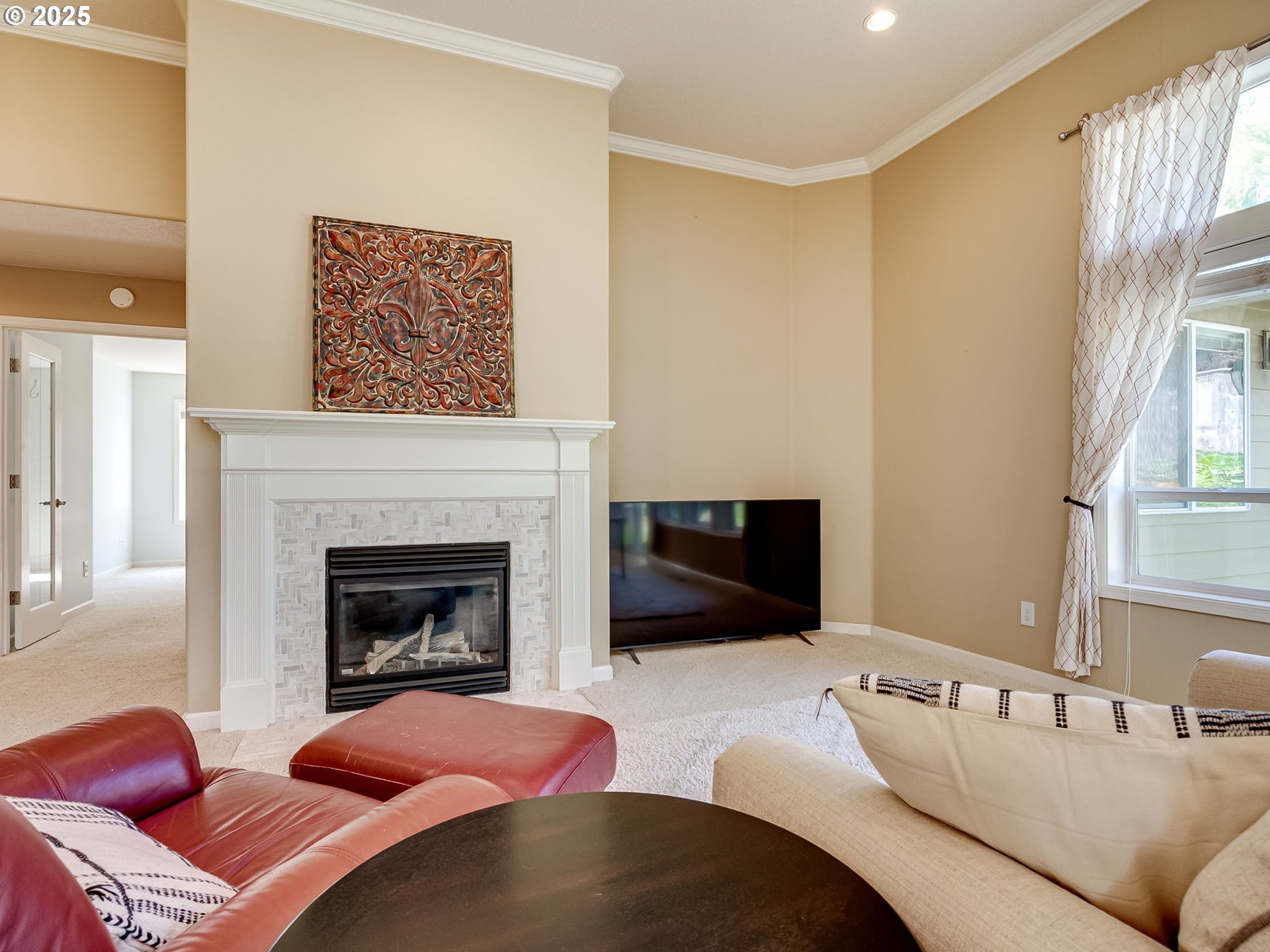 2745 Northwest 29th Avenue Camas, WA 98607 - Photo 11 of 29 a bedroom with a bed and a fireplace