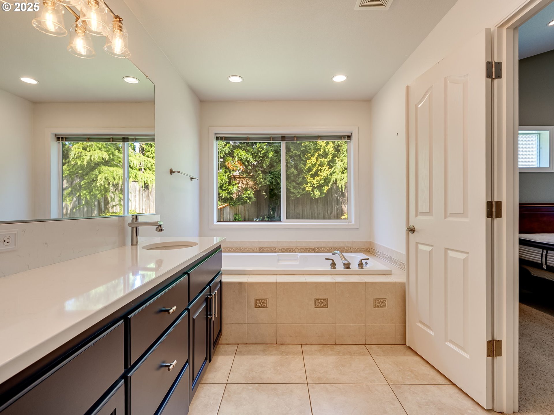 2745 Northwest 29th Avenue Camas, WA 98607 - Photo 15 of 29 a bathroom with a bathtub and a sink