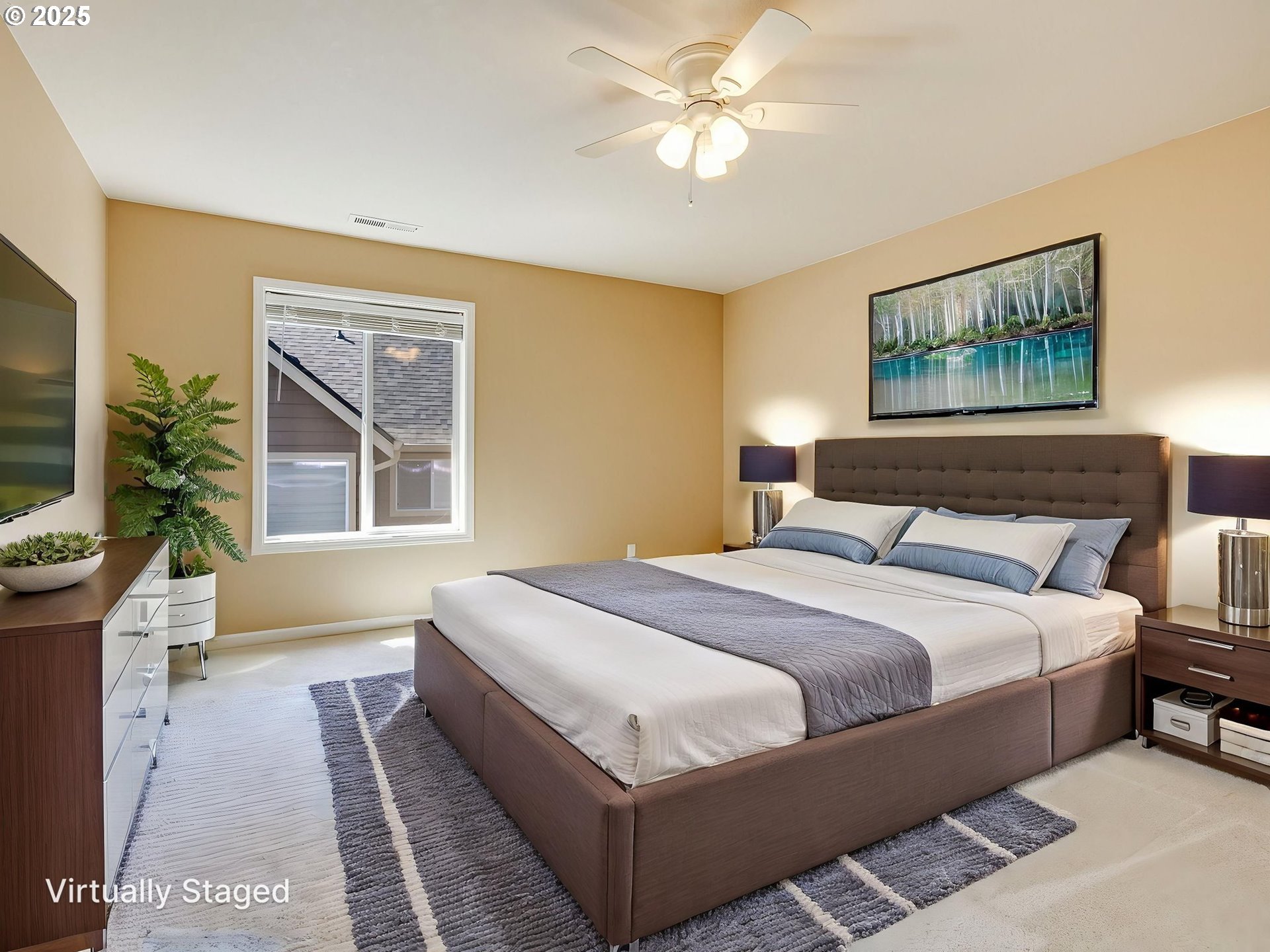 2745 Northwest 29th Avenue Camas, WA 98607 - Photo 20 of 29 a bedroom with a large bed and a chandelier