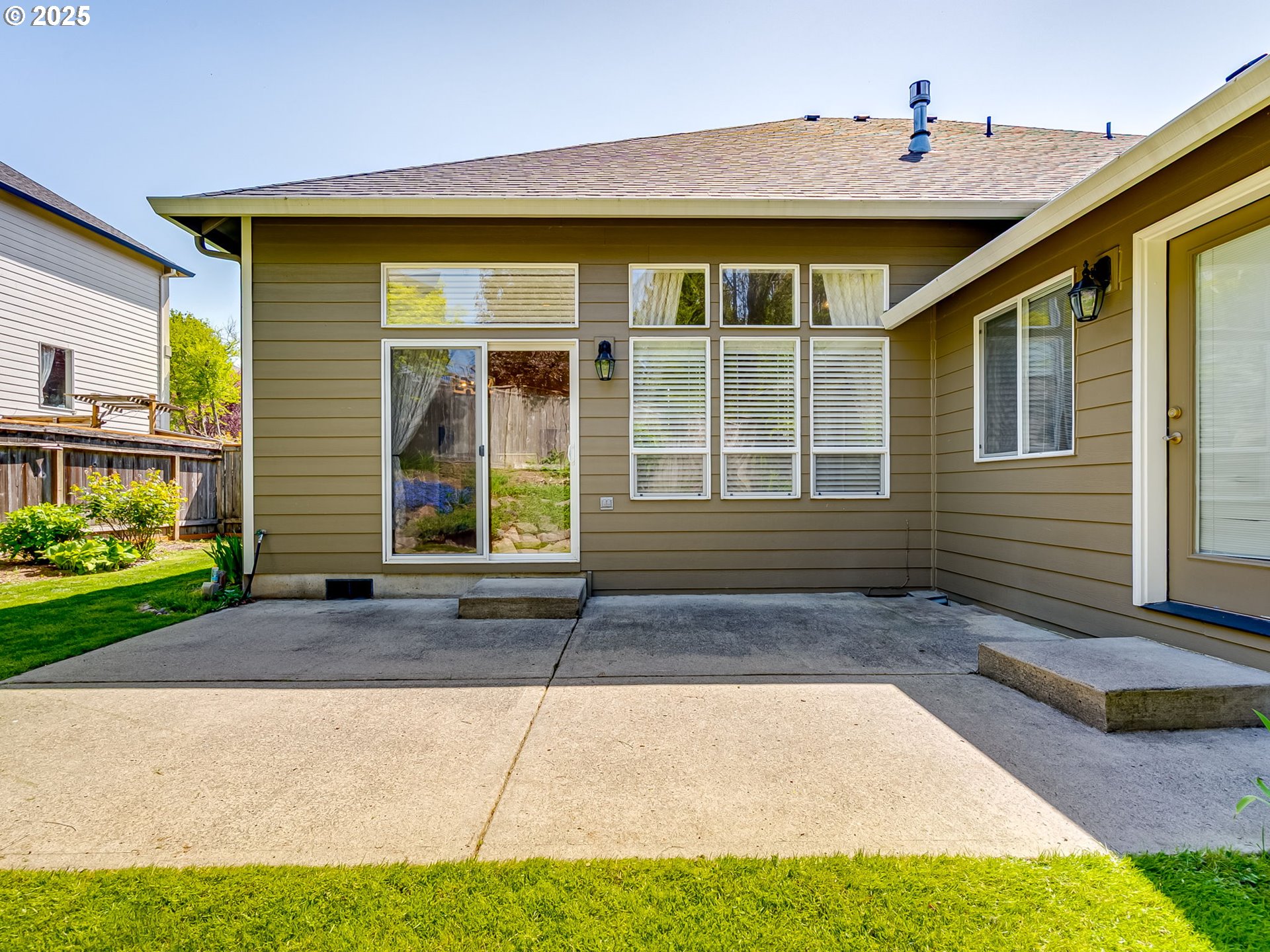2745 Northwest 29th Avenue Camas, WA 98607 - Photo 26 of 29 a front view of a house with a yard and garage