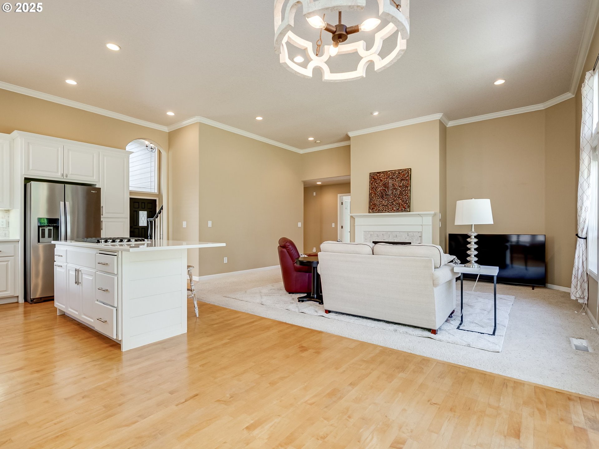 2745 Northwest 29th Avenue Camas, WA 98607 - Photo 9 of 29 a living room with furniture and a flat screen tv