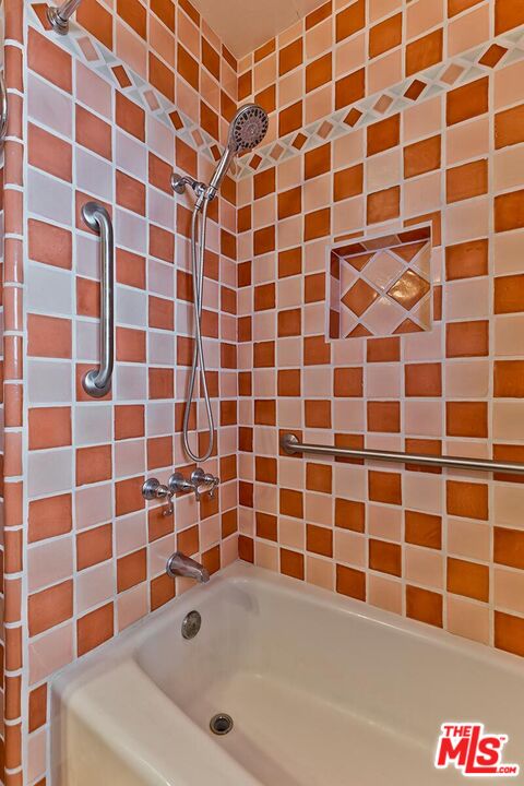 1657 East 218th Street Carson, CA 90745 - Photo 23 of 24 a bathroom with a bathtub and a shower