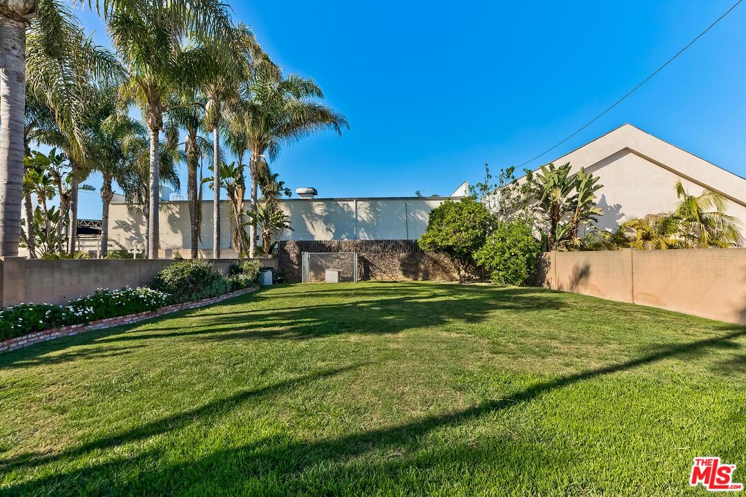 1657 East 218th Street Carson, CA 90745 - Photo 3 of 24 a view of a house with a yard