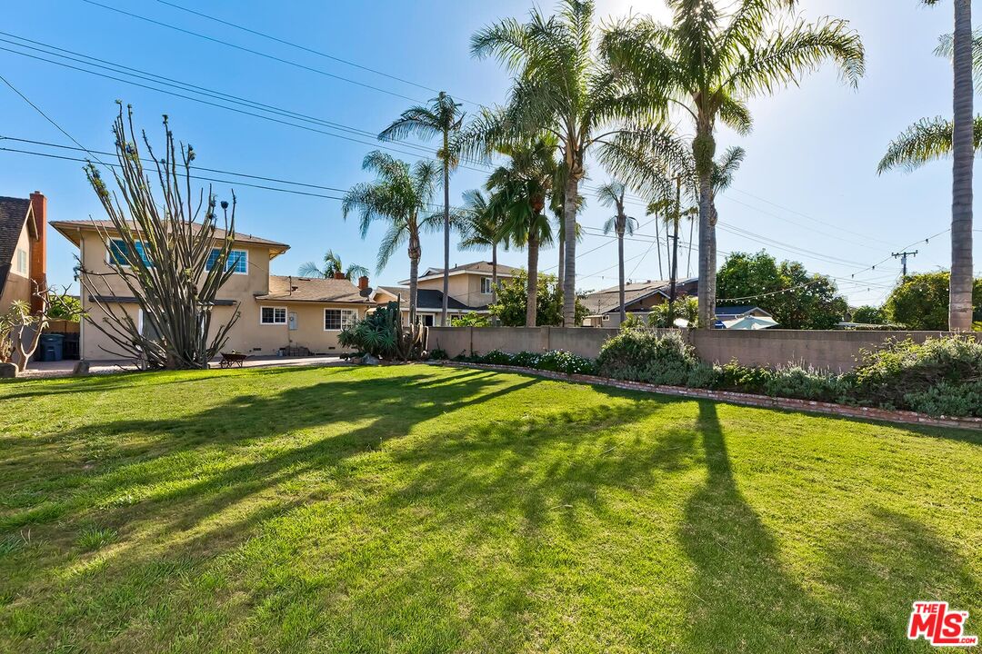 1657 East 218th Street Carson, CA 90745 - Photo 6 of 24 a swimming pool with outdoor seating and yard