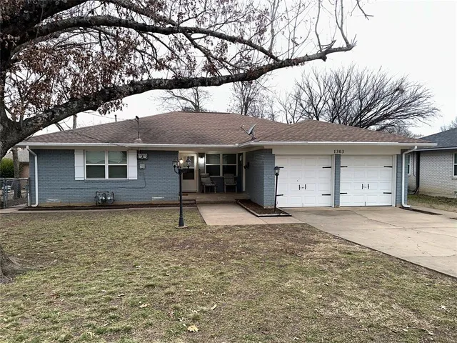 a house with trees in the background