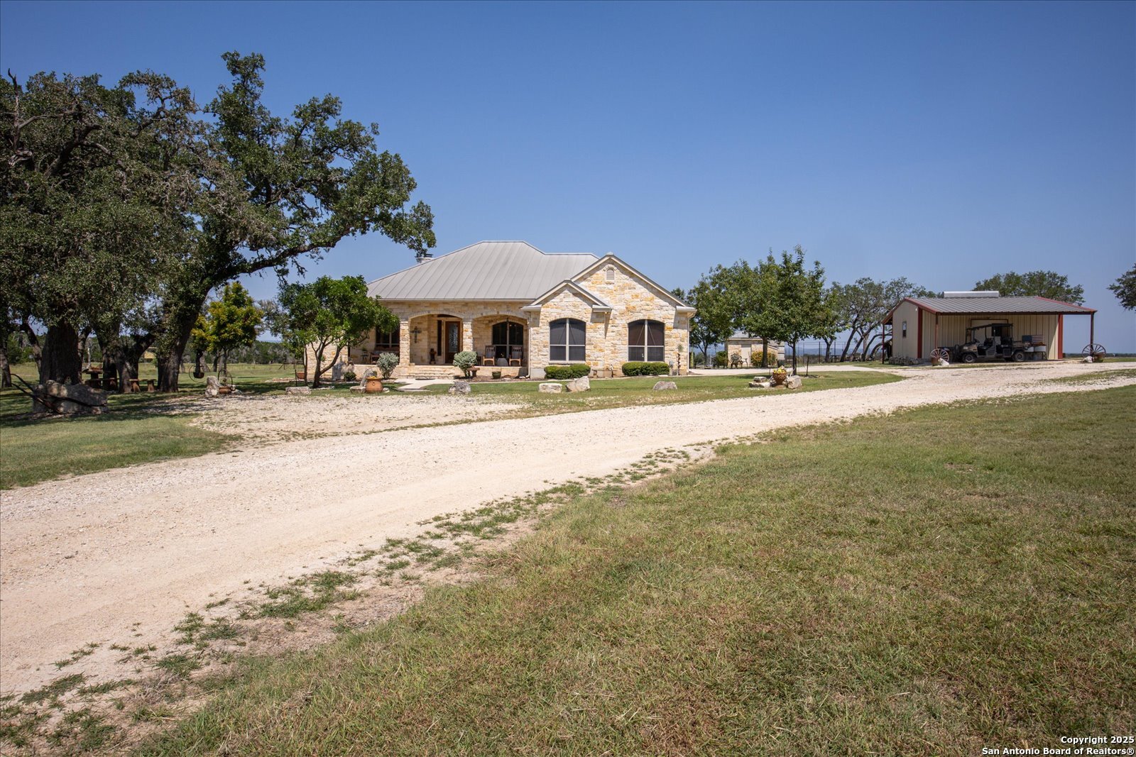 34 Cravey Road Boerne, TX 78006 - Photo 51 of 59 a front view of a house with a yard