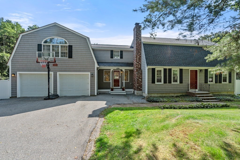 179 Baldwin Road Billerica, MA 01821 - Photo 1 of 38 front view of a house with a yard