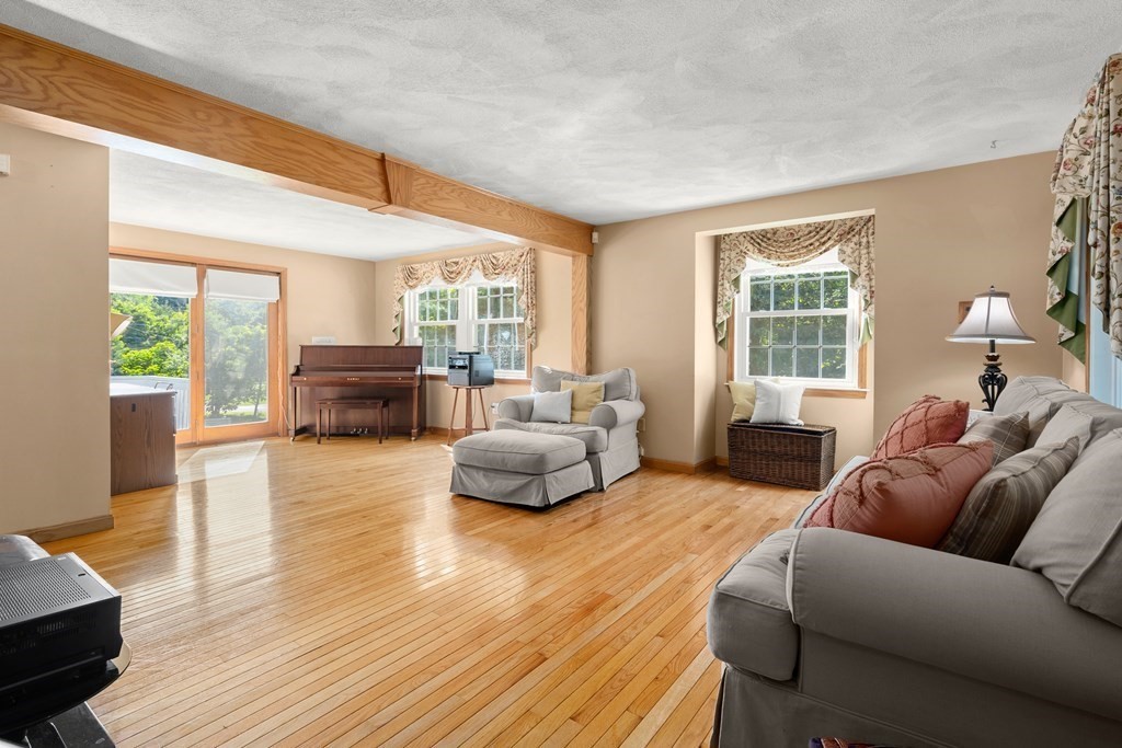 179 Baldwin Road Billerica, MA 01821 - Photo 11 of 38 a living room with furniture and a large window