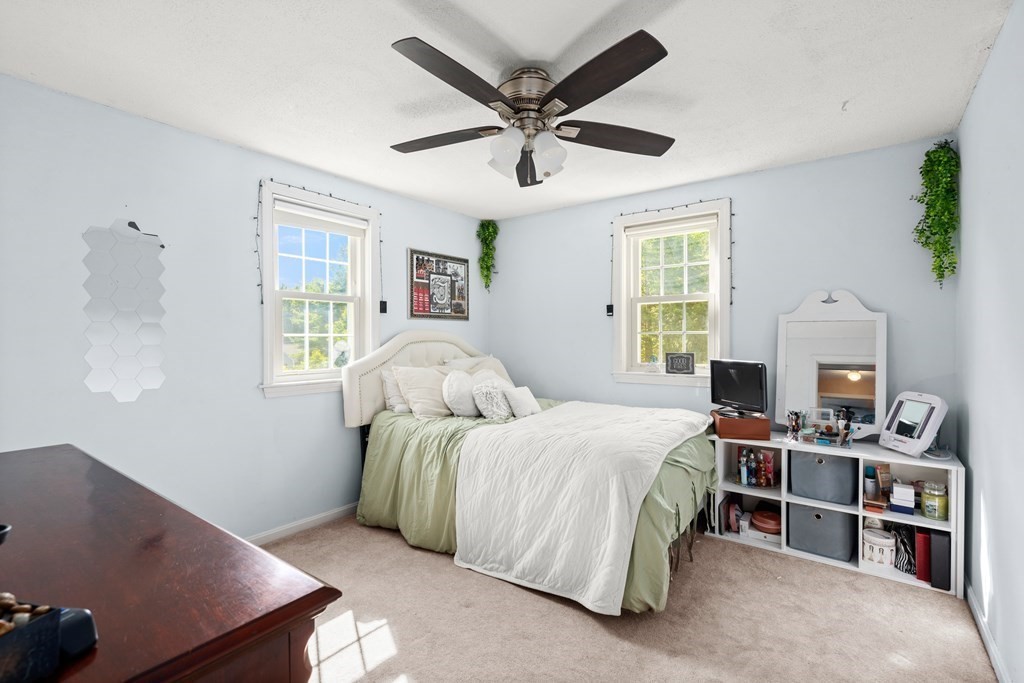 179 Baldwin Road Billerica, MA 01821 - Photo 14 of 38 a bedroom with a bed furniture and a window