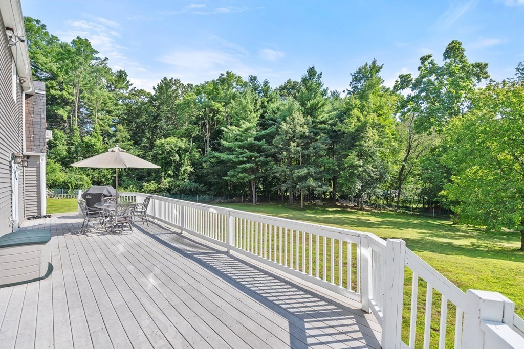 179 Baldwin Road Billerica, MA 01821 - Photo 24 of 38 a view of a chairs and table on the wooden floor
