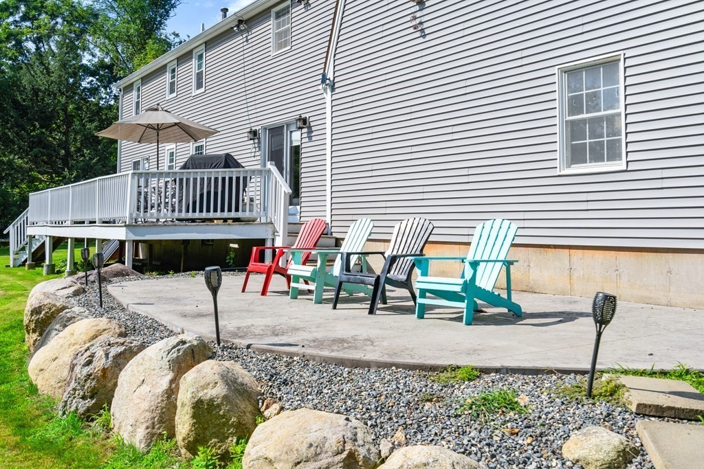 179 Baldwin Road Billerica, MA 01821 - Photo 27 of 38 a view of a house with backyard and sitting area