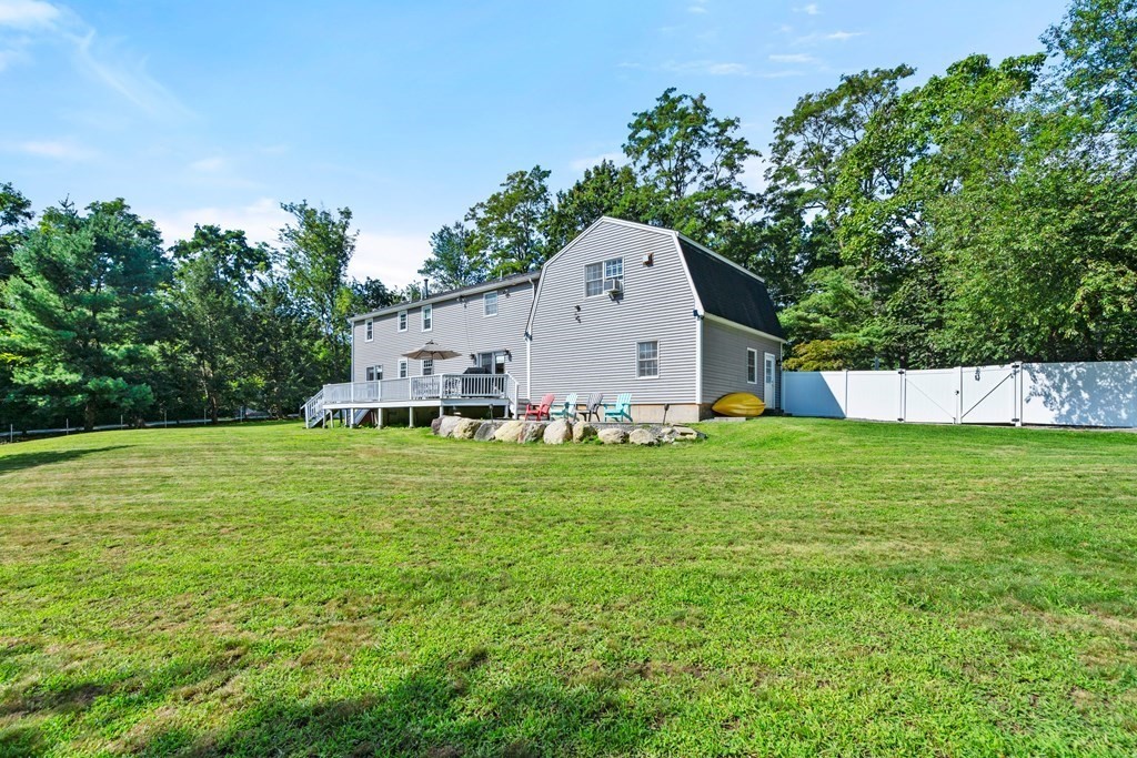 179 Baldwin Road Billerica, MA 01821 - Photo 32 of 38 a view of a back yard with an outdoor space