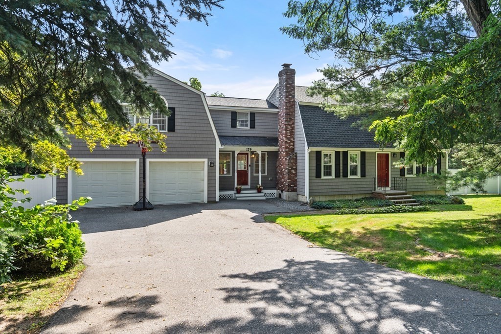 179 Baldwin Road Billerica, MA 01821 - Photo 34 of 38 a front view of a house with swimming pool and a yard
