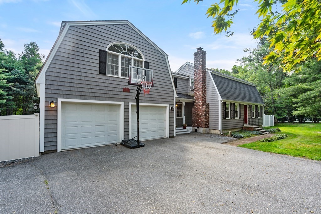179 Baldwin Road Billerica, MA 01821 - Photo 36 of 38 front view of a house with a yard