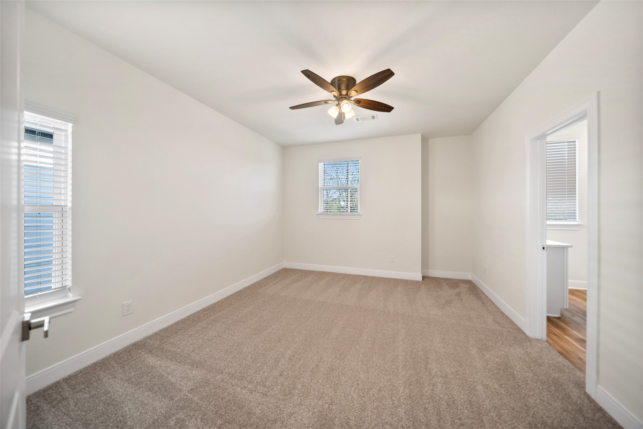 412 West Marlin Street Willis, TX 77378 - Photo 13 of 22 a view of an empty room with a window