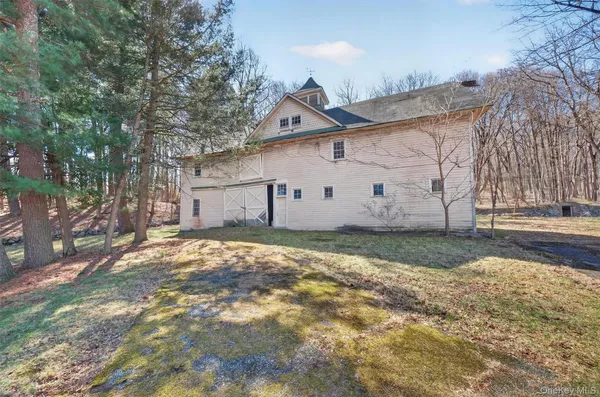 a view of a house with a snow in the yard
