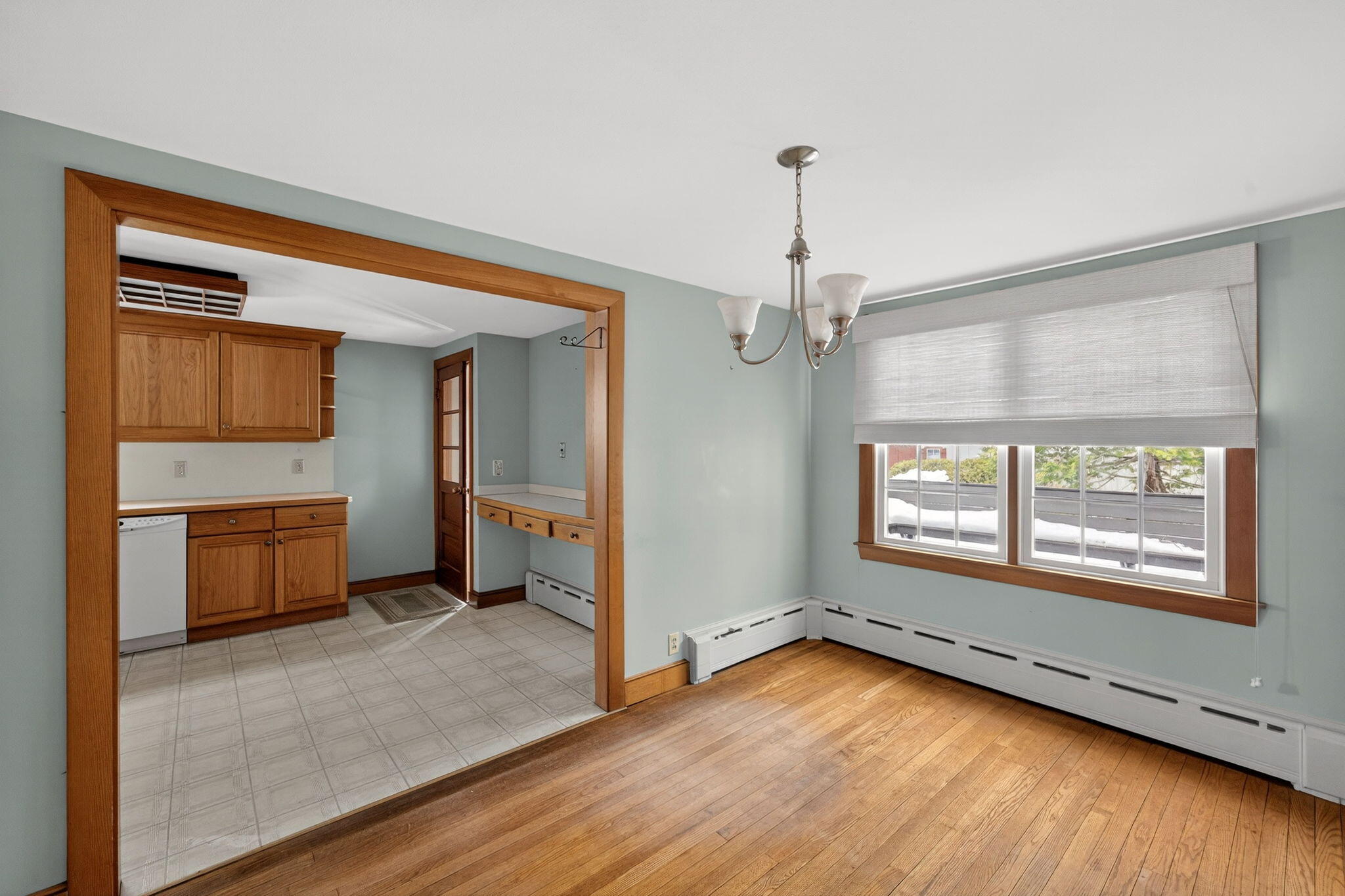 56 Raymond Street Falmouth, MA 02540 - Photo 16 of 45 a view of empty room with a fireplace and wooden floor